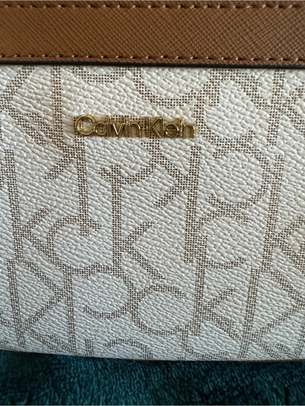 Calvin Klein White & Tan Logo wristlet with Gold Hardware